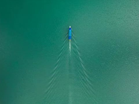Top Down Drone View of Centered Boat with Large Wake Trail Albania Stock Photos