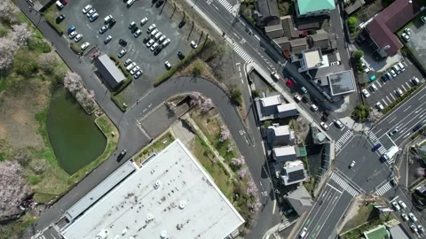 Top Down Drone View of City Streets and Parking Lots in Tsuyama 스톡 동영상 347455182