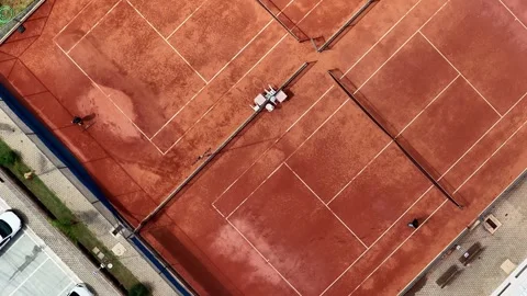 Top-Down Drone View of Clay Tennis Court Maintenance in Sao Paulo Stock-Footage 344577498