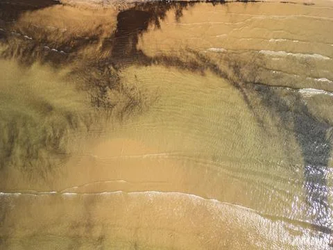 Top Down Drone View of Clear Shallow Water and Sand Durres Albania Фото