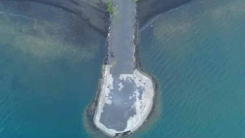 Top down drone view of coastal breakwater and harbour entrance. Stock Footage 337794120