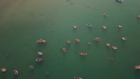 Top Down Drone View of Colorful Fishing Boats in Calm Sea Stock Footage 340487360