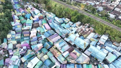 Top Down Drone View of Colorful Urban Neighborhood in Indonesia Stock Footage 340542579
