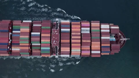 Top down drone view of a container ship sailing on the sea Stock Footage 332869874