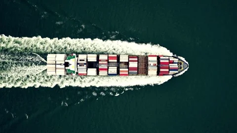 Top down drone view of container ship sailing in open water Stock Footage 332870023