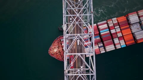 Top Down Drone View Of Container Ship Under Bridge on a Panama Canal 스톡 동영상 337378283