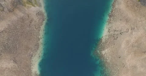 Top-down drone view of coral reef and turquoise lagoon in West Bali National Stock-Footage 331105548