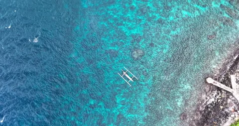 Top Down Drone View of Coral Reef and Coastline in Amed Bali Stock Footage 334374075