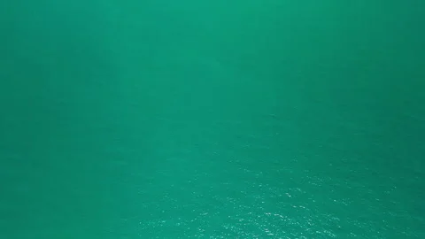 Top Down Drone View of Deep Turquoise Sea Surface Vídeo Stock 340120111