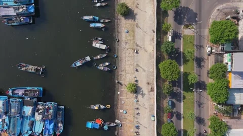 Top Down Drone View of Fishing Boats and Coastal Road in Da Nang Stockbeeldmateriaal 340199116