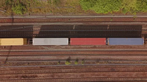 Top Down Drone View Of Freight Train Carrying Shipping Containers Stock Footage 334648764
