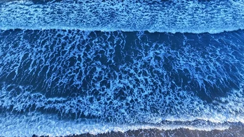 Top-Down Drone View of Gentle Ocean Waves | 4K Aerial Forward Motion Stock Footage 294972728