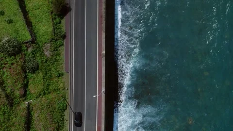 Top down drone view of the highway on the ocean coast Stock Footage 278904667