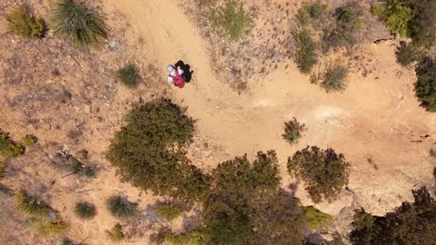 Top Down Drone View of Hiker Ascending Mountain Trail Stock Footage 334437474