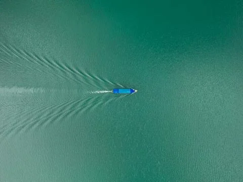 Top Down Drone View of Horizontal Boat with Triangular Wake Albania Stock Photos