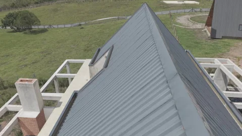 Top Down Drone View House Under Construction with Metal Roof Vídeos de archivo 331819872