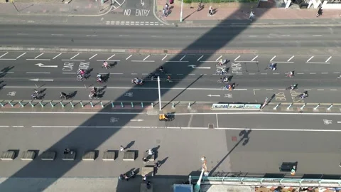 Top-Down Drone View of Kidical Mass Cycling Event, Brighton Seafront Stock Footage 314275177