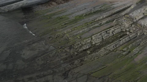 Top down Drone view of a low tide reef in Spain 4K Stock Footage 137708688