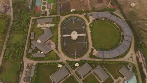 Top Down Drone View of Luxury Resort Landscape with Oval Reflecting Pool Stock Footage 341084140