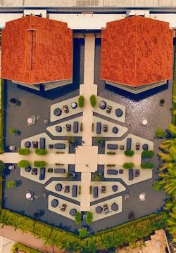 Top Down Drone View of Luxury Hotel Courtyard with Symmetrical Water Features Stock-Fotos