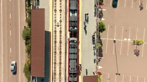 Top down drone view of modern train station platform with rail tracks Stock Footage 330517458