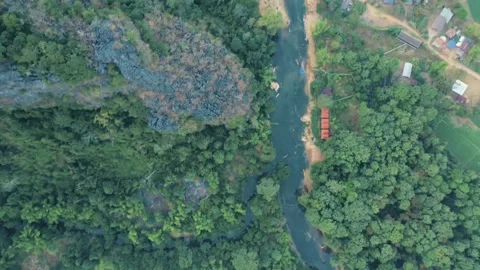 Top down drone view of Nam Hinboun river in Kong Lor, Laos Stock Footage 247383096