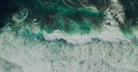 Top Down Drone View of Ocean Foam Waves Creating Natural Texture Video stock 330589784