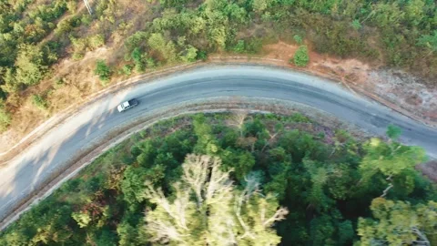 Top down drone view of a road with low traffic in Thalang, Laos Stock Footage 247866416