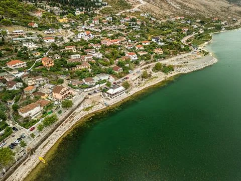 Top Down Drone View of Shiroka Town End Lakefront Vegetation Albania Stock Photos