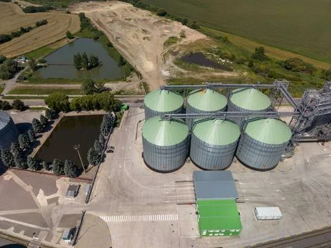 Top Down Drone View of Six Green Roof Silos Near Water Reservoirs Fotos Stock