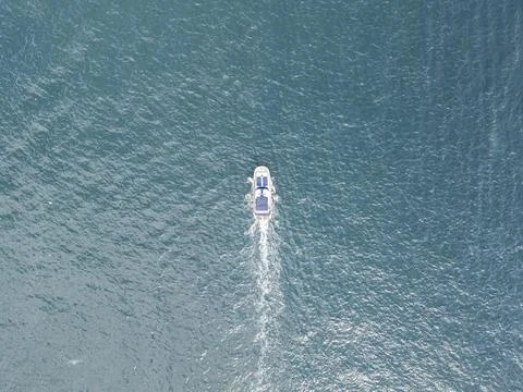 Top Down Drone View of Small Yacht on Bosphorus Sea Stock Photos