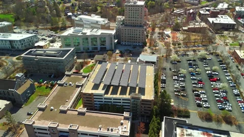 Top Down Drone View Of Solar Panel Canopies On A Parking Garage Roof Stock Footage 341975499