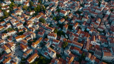 Top-down drone view of Split Old Town rooftops at sunrise revealing the Video stock 341673605