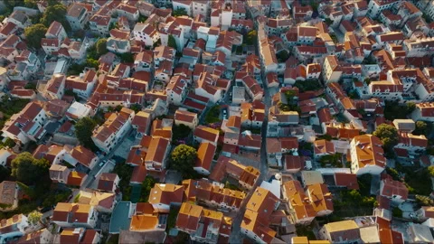Top-down drone view of Split Old Town rooftops at sunrise revealing the Video stock 341673658