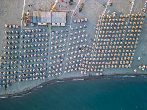 Top Down Drone View of Straw Umbrellas and Beach Bar Velipoja Stock Photos