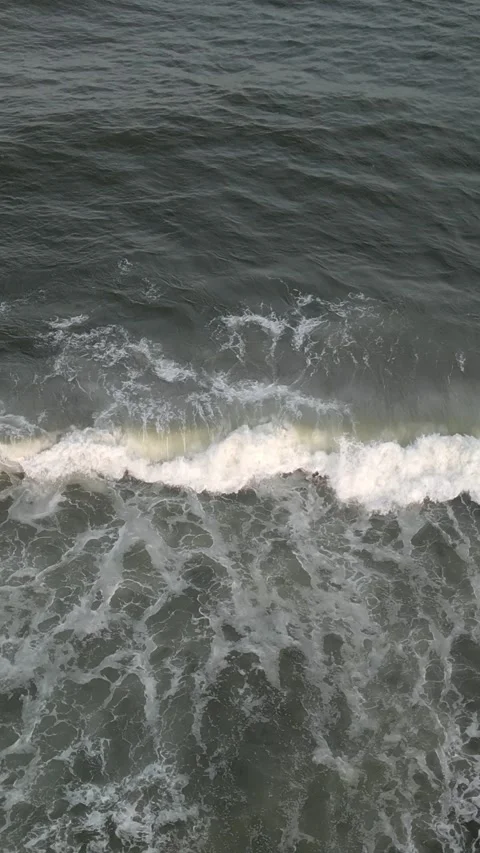 Top Down Drone View of Surfer in Ocean Waves. Stock Footage 330441628
