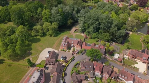 Top-Down Drone View Tilting Up to Reveal Warwick Village, Castle Dungeon, and 스톡 동영상 331044646