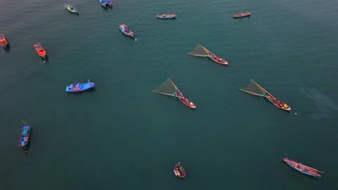 Top Down Drone View of Traditional Fishing Boats on Calm Sea in Vietnam Stock Footage 340487426