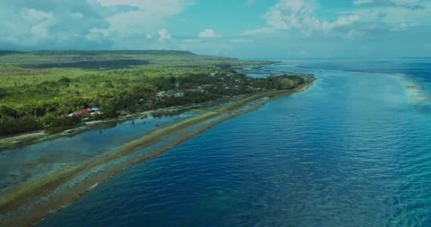 Top Down Drone View of Turquoise Ocean Waves  Breaking on Sandy Beach Stock Footage 329193248