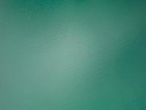 Top Down Drone View of Turquoise Calm Water of Lake Shkodra Albania Stock Photos
