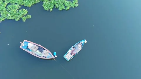 Top Down Drone View of Two Fishing Boats Floating on Calm Blue Water Stock-Footage 338119680