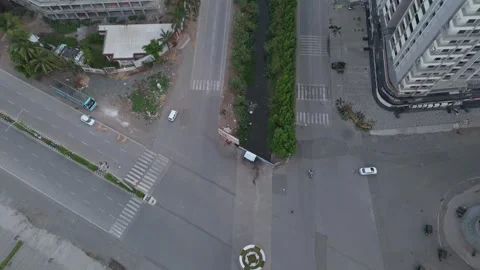Top Down Drone View of Urban Road Intersection with Moving Traffic Stock-Footage 338226809