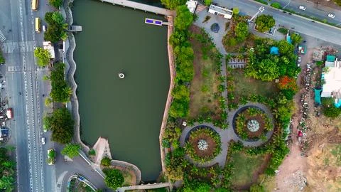 Top Down Drone View of Urban Park with Circular Garden Design and Lake Stock-Fotos