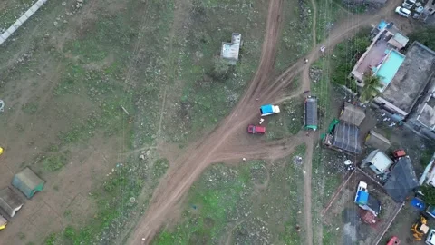 Top-Down Drone View: Vehicles Navigating Rural Trails. Stock Footage 342277678