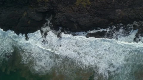 Top-Down Drone View of Waves Crashing on Rocky Wild Coast, South Africa.hor.. Stock Footage 341427713