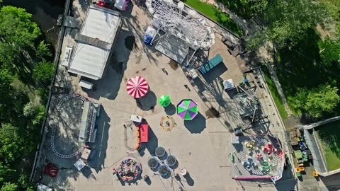 Top-Down Drone Zoom-Out Video of Colorful Amusement Park at City Park, Budapest  Stock Footage 314104512