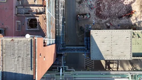 Top down drop over pipes containers and work yard Stock Footage 343742706