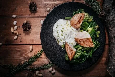 Top-down, elevated shot featuring a gourmet grilled chicken dish accompanied  스톡 사진