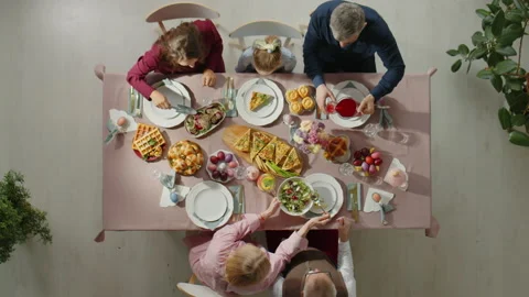 Top Down of Family Having Easter Dinner Stock Footage 224552936