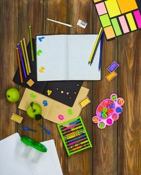 Top down flat lay representing the idea of going back to school. Mock up sh.. Фото